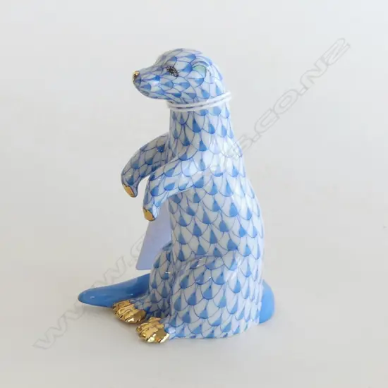 A Herend Porcelain otter,  in blue 'fishnet' pattern